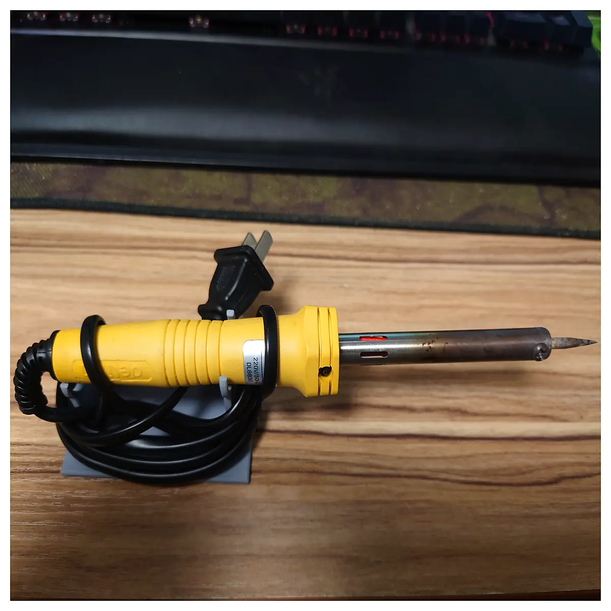 soldering iron holder with sponge and brass tip cleaner for electronics repair workbench