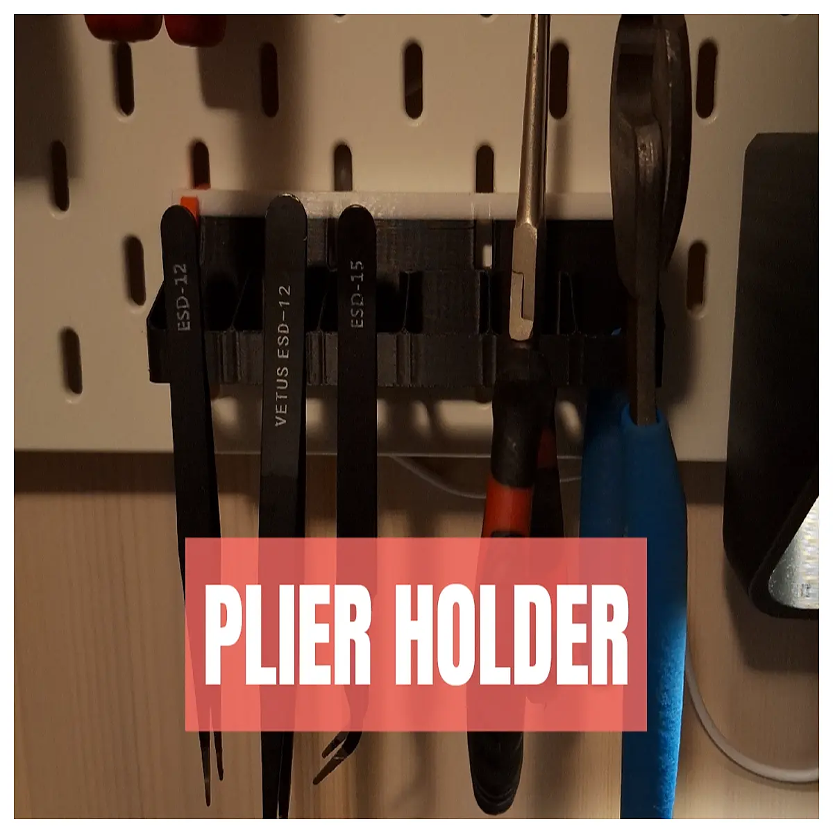 skadis pegboard tool organizer with pliers holder and tweezers rack for workshop wall storage