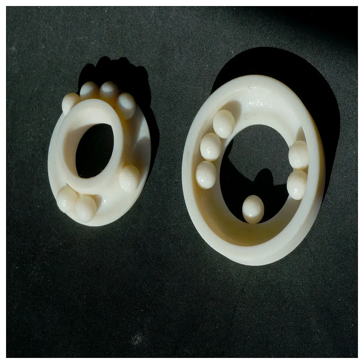 diagonal axial snap fit bearing housing for rotating machinery parts