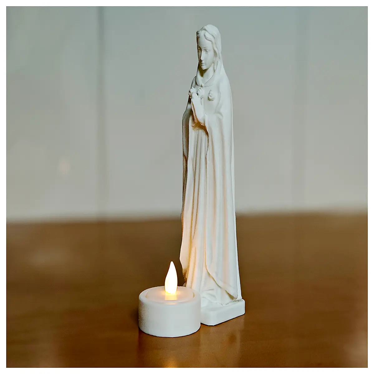 holy mary statue with glowing divine religious decor for home altar