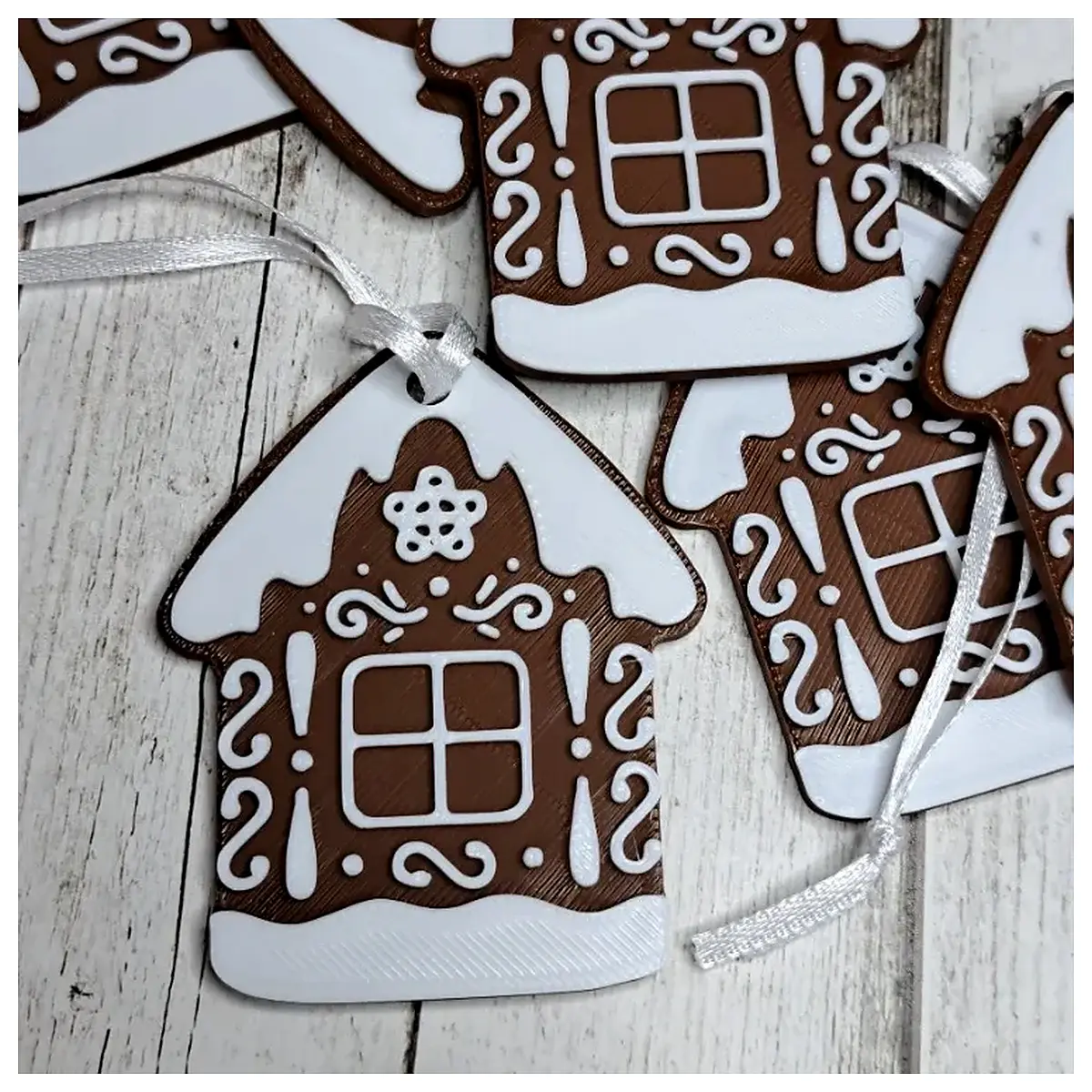 diy gingerbread house with icing pens candy decorations christmas craft activity for kids adults holiday party favor