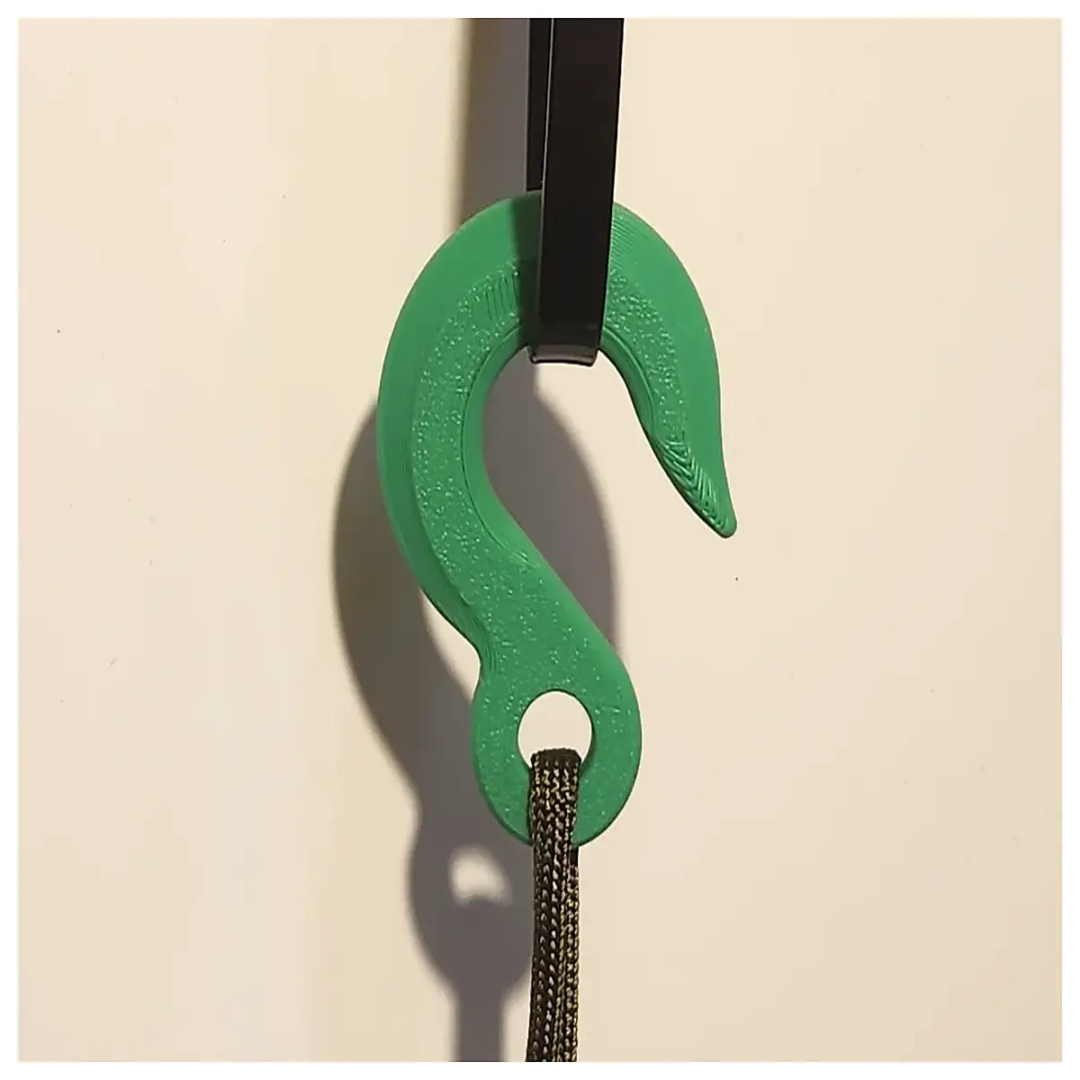 duty adhesive hooks with integrated cable management loop for organizing wires cords and charging stations on walls