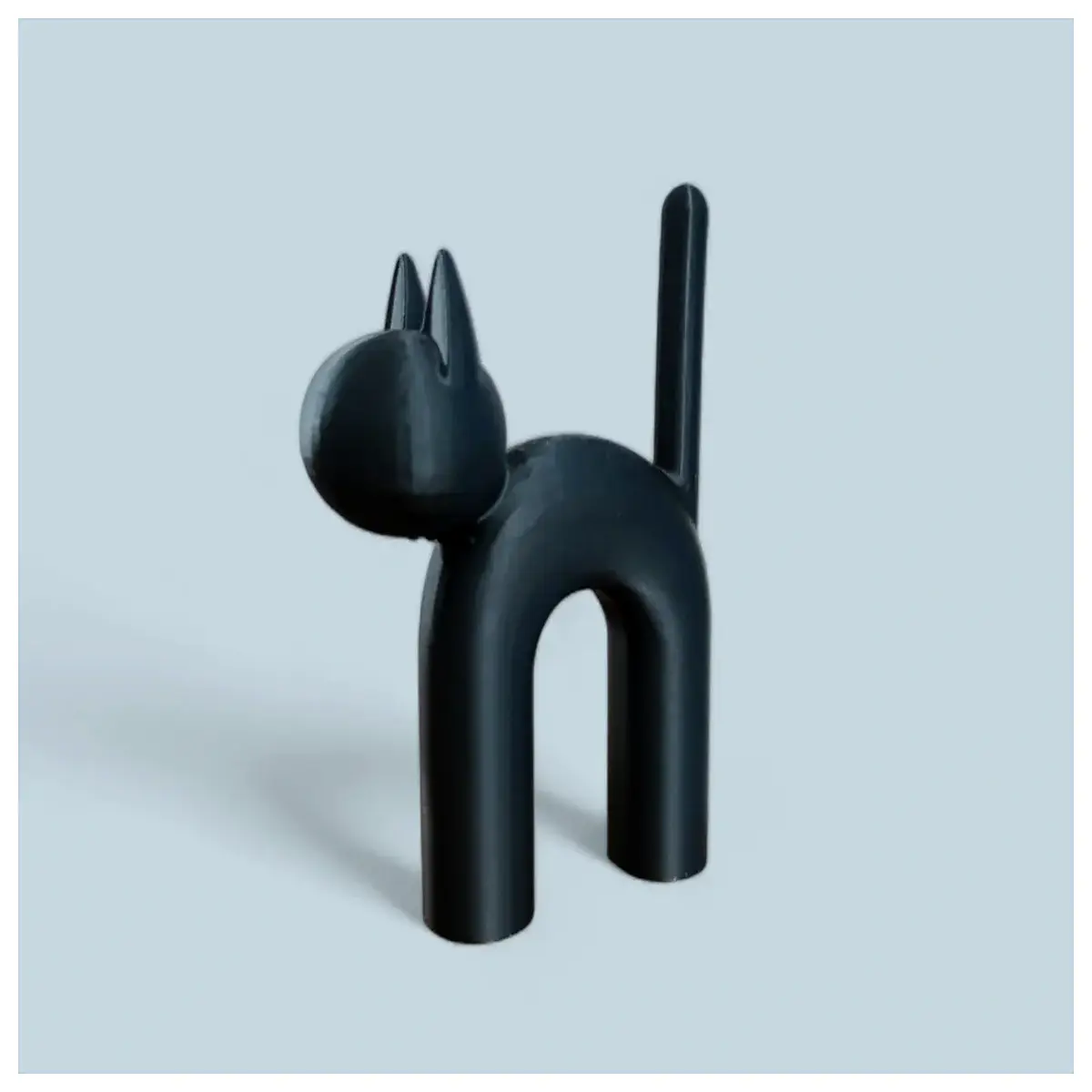 modern minimalist cat decor abstract feline art print sleek black white animal sculpture contemporary home office desk accessory trendy pet lover gift