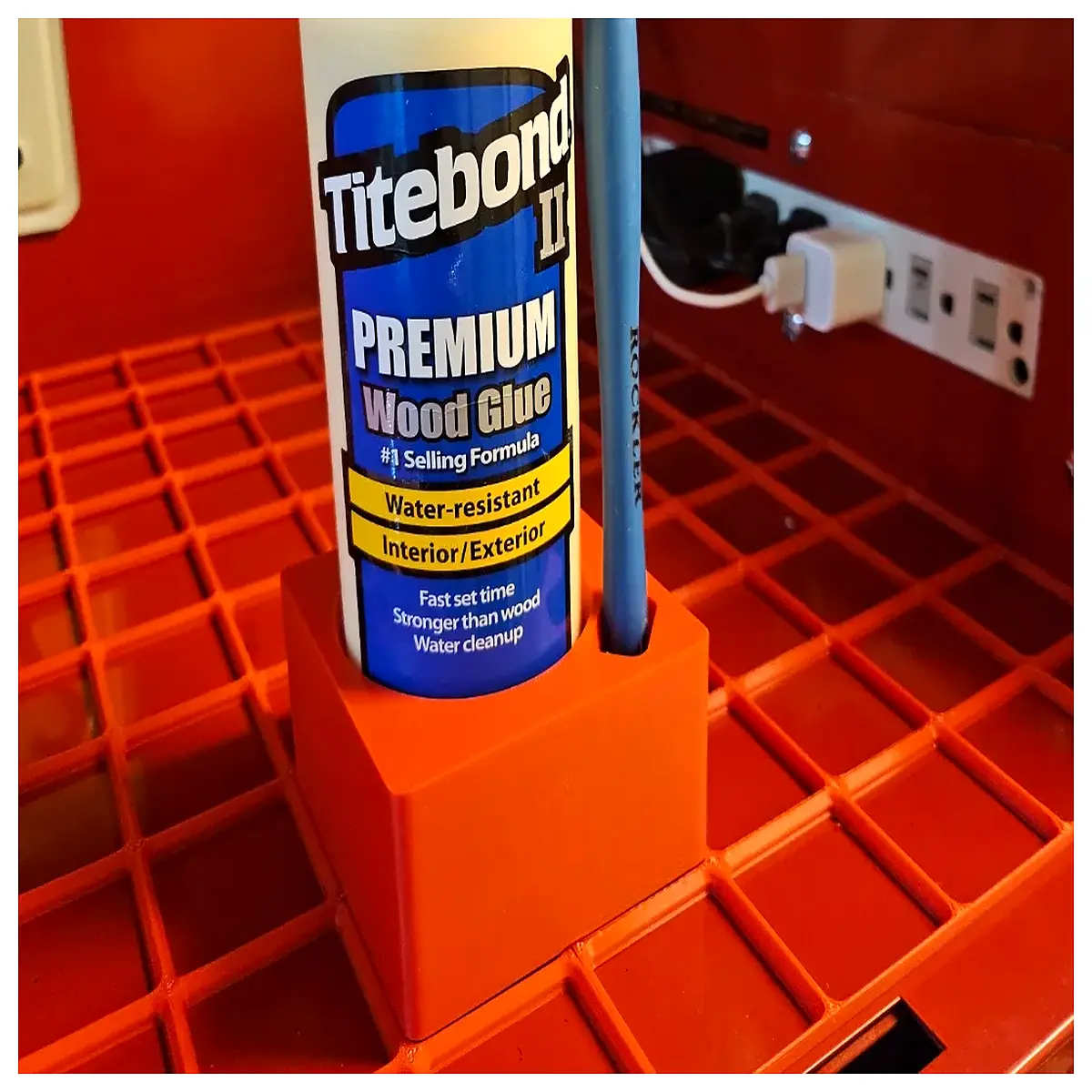 gridfinity organizer bins with glue and brush for workshop storage