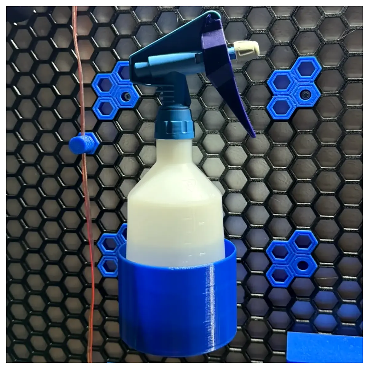 honeycomb wall mounted bottle organizer rack storage holder for cleaning supplies bathroom kitchen