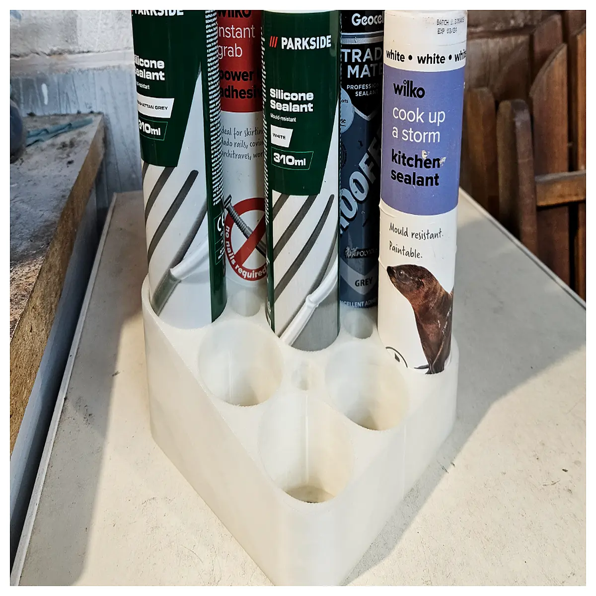 silicone sealant tube organizer caddy 3x3 small storage rack for caulk guns bathroom kitchen supplies
