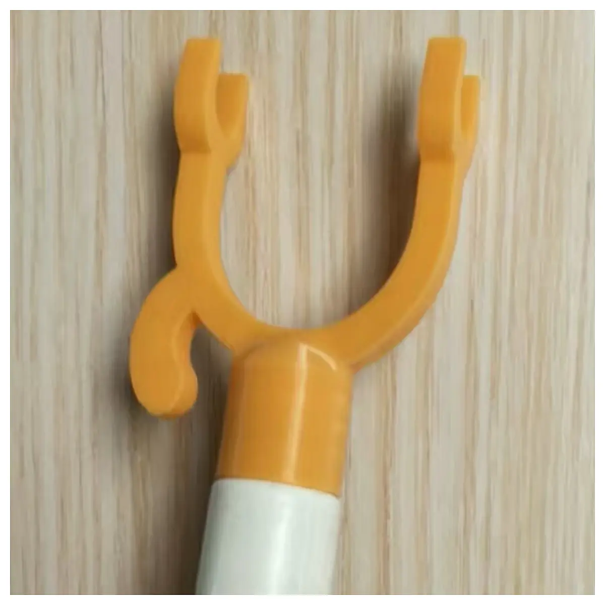 extendable pole hook with threaded tip for reaching high shelves clothes hanging tool