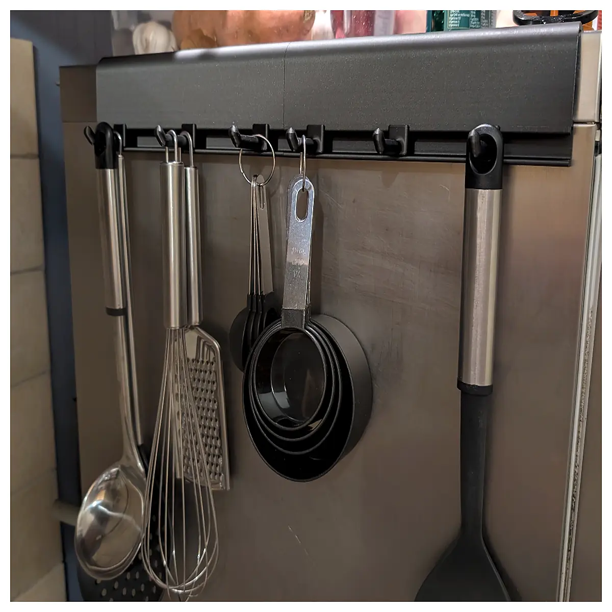 kitchen utensil holder rack with adjustable hooks for pots pans ladles spatulas hanging organizer
