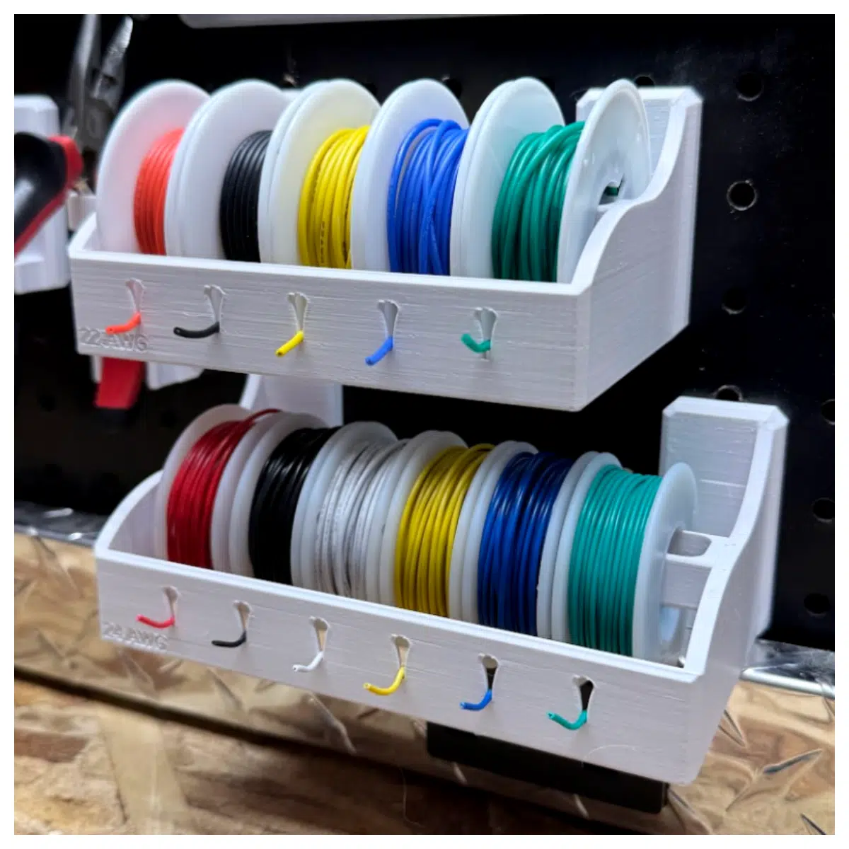 perforated board spool holder organizer rack for wire cable reel storage workshop