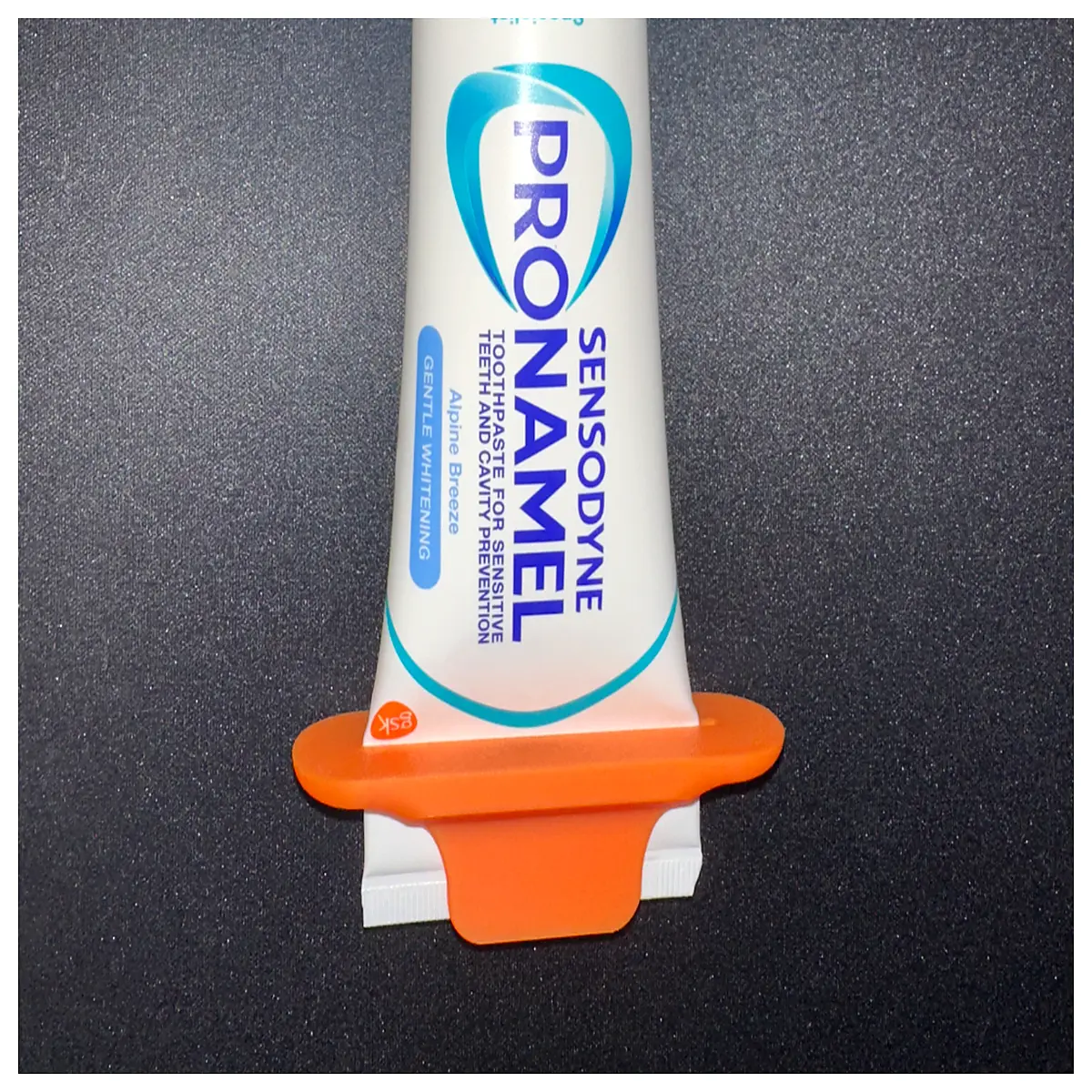 ergonomic toothpaste squeezer tube press holder for bathroom sink