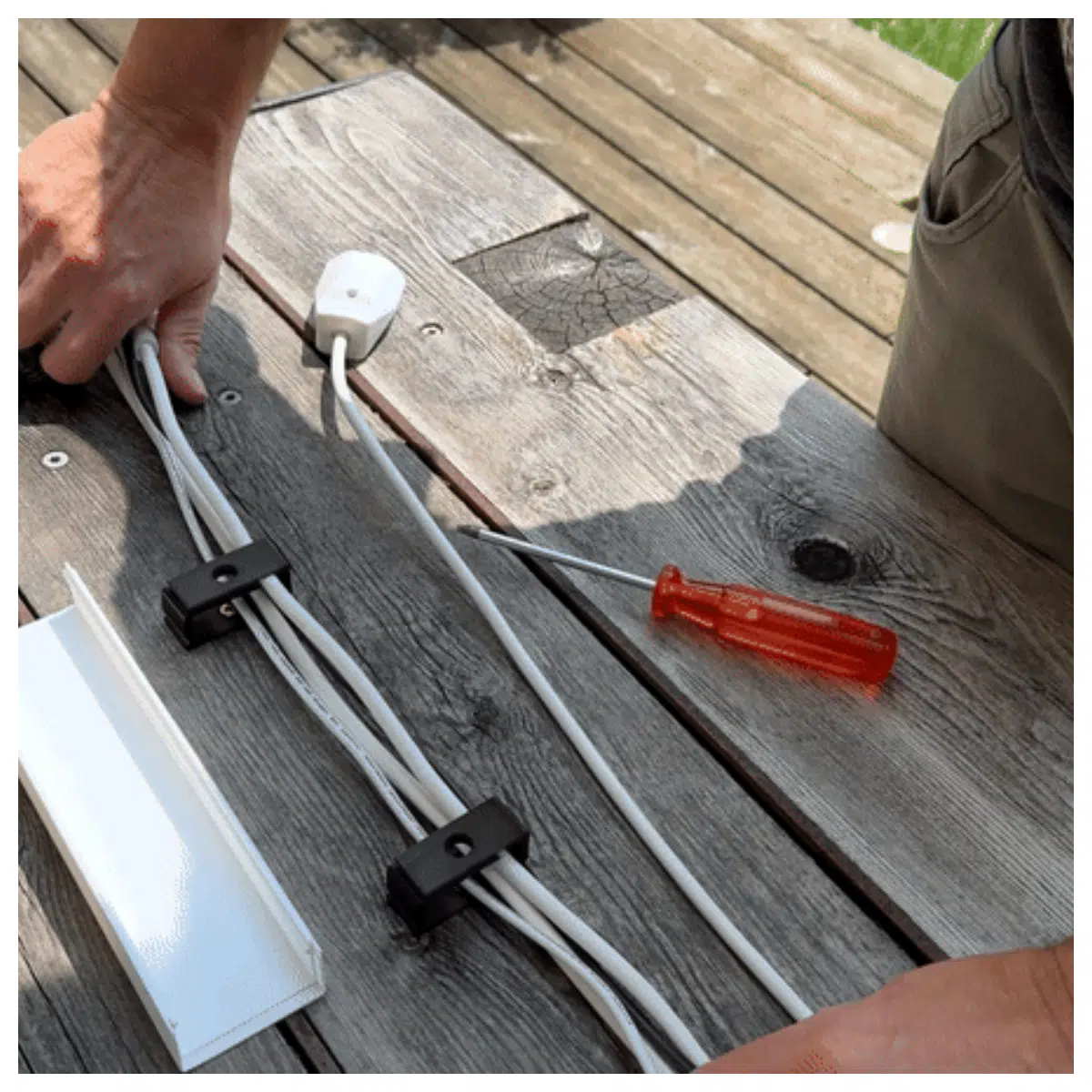 duty cable tray with snap on cover and locking clips for industrial wire management