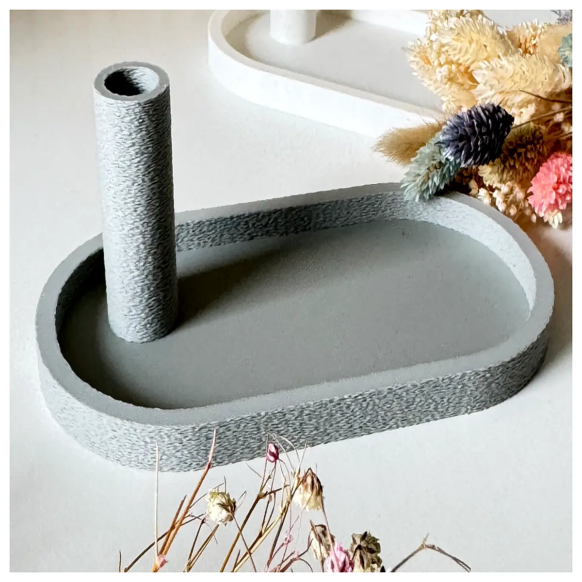 decorative tray with tall vase centerpiece for coffee table styling