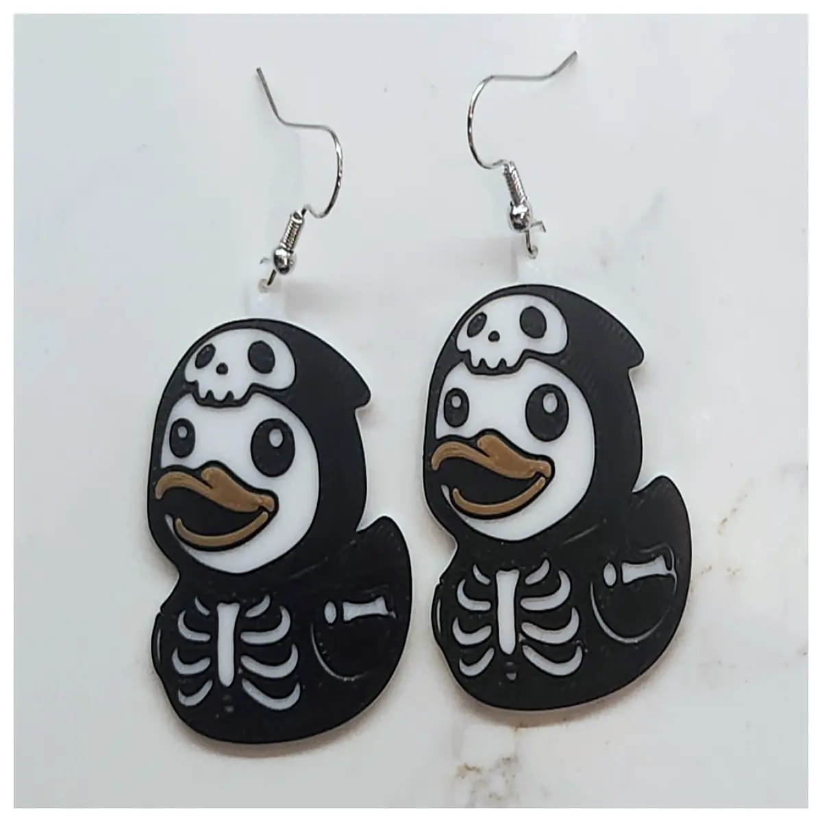 gothic punk skull rubber duck earrings for women edgy alternative jewelry cute yet creepy dangle studs goth teens