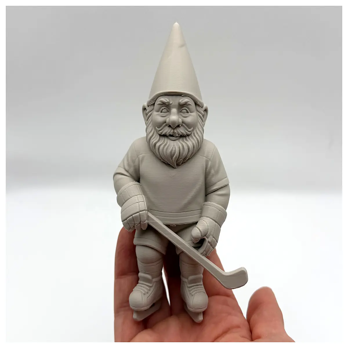garden gnome ice hockey player statue outdoor lawn ornament winter sports decor