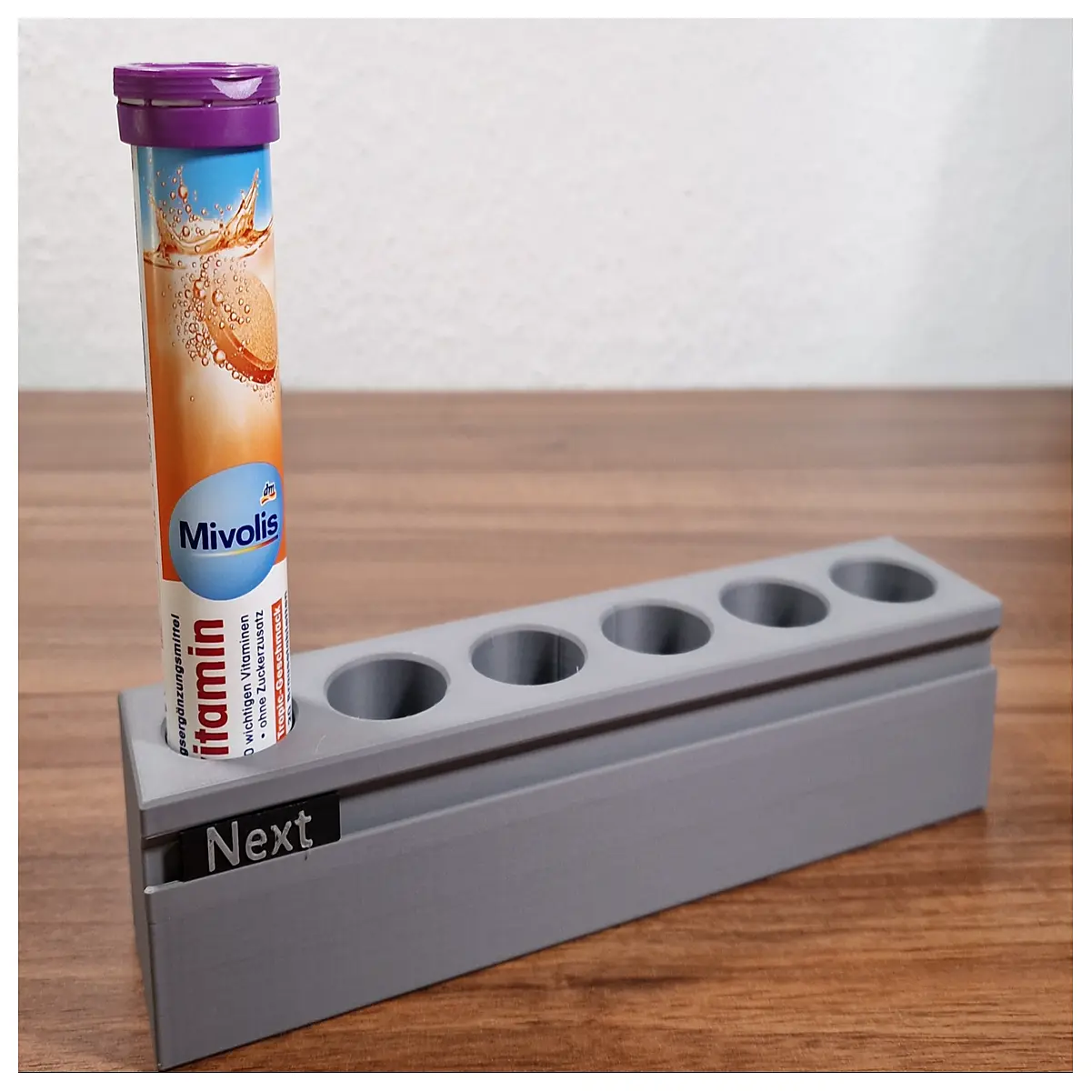 dissolvable tablet holder with slider for bathroom sink organizer