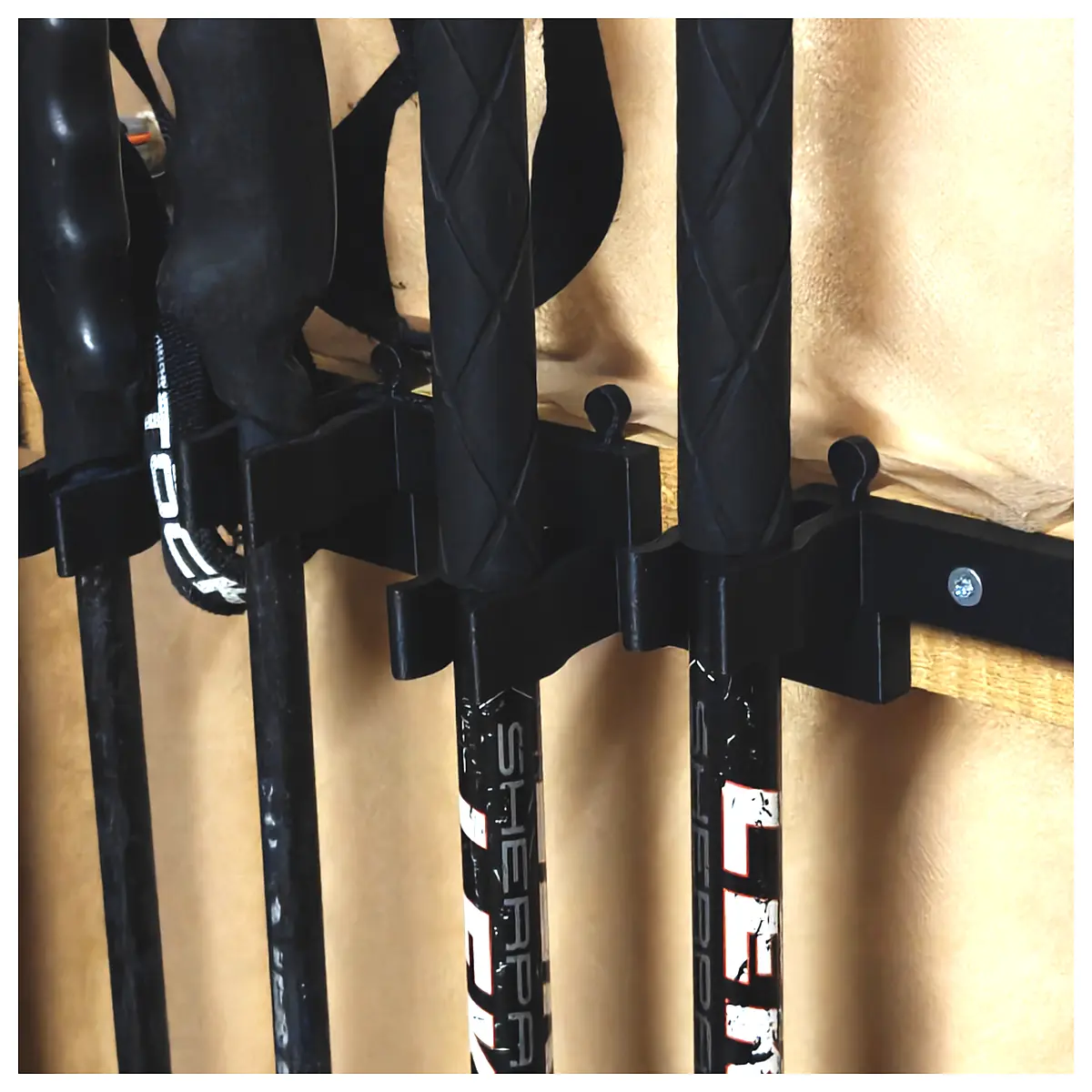 ski pole clip holder for jacket sleeve snowboard gear organizer