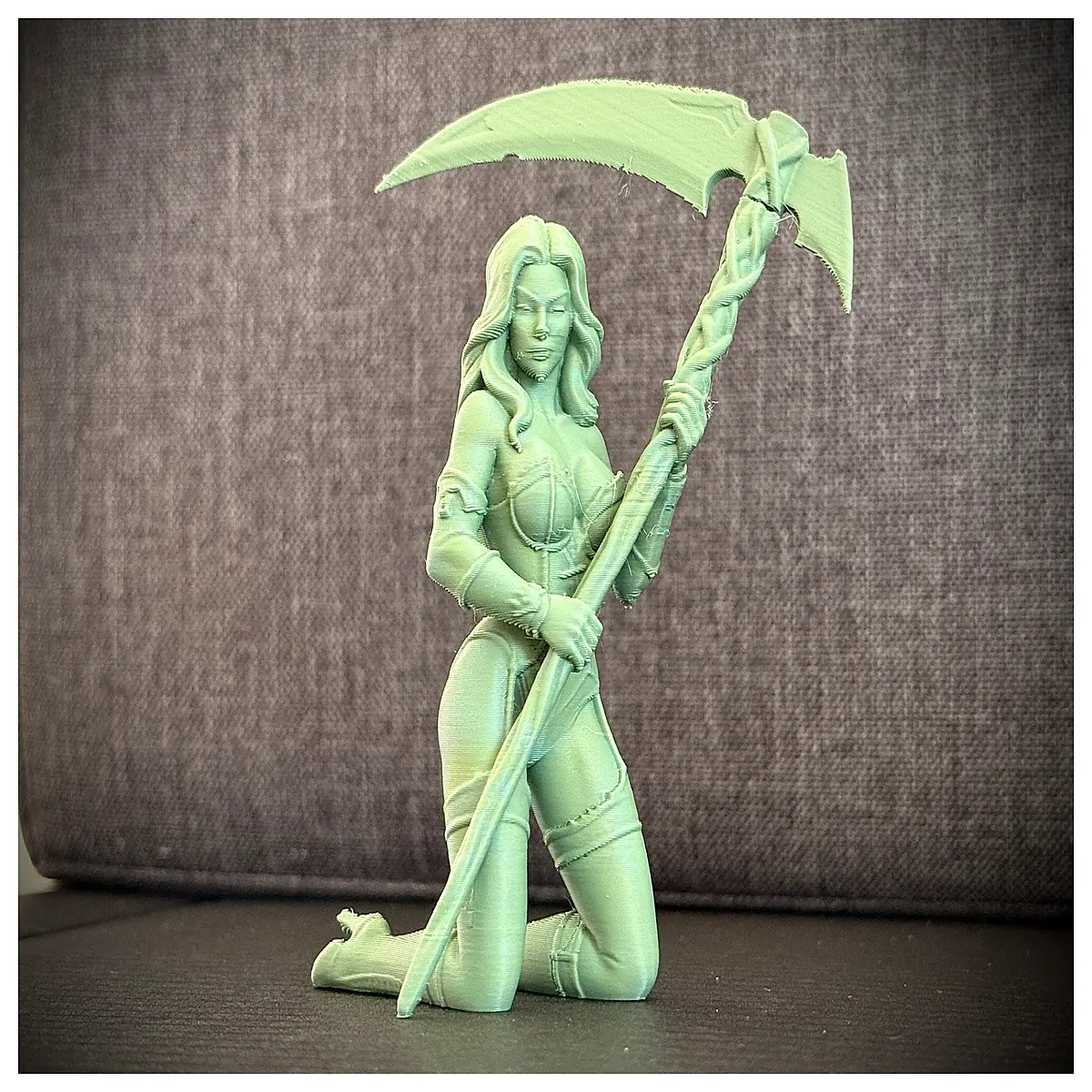 kneeling grim female cosplay prop statue