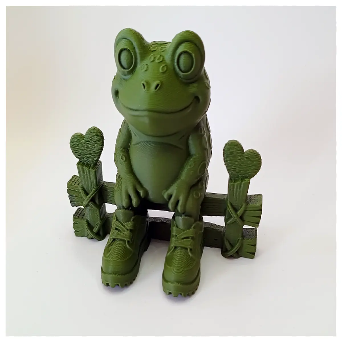 whimsical shaped statue sitting on bench garden decor outdoor yard ornament