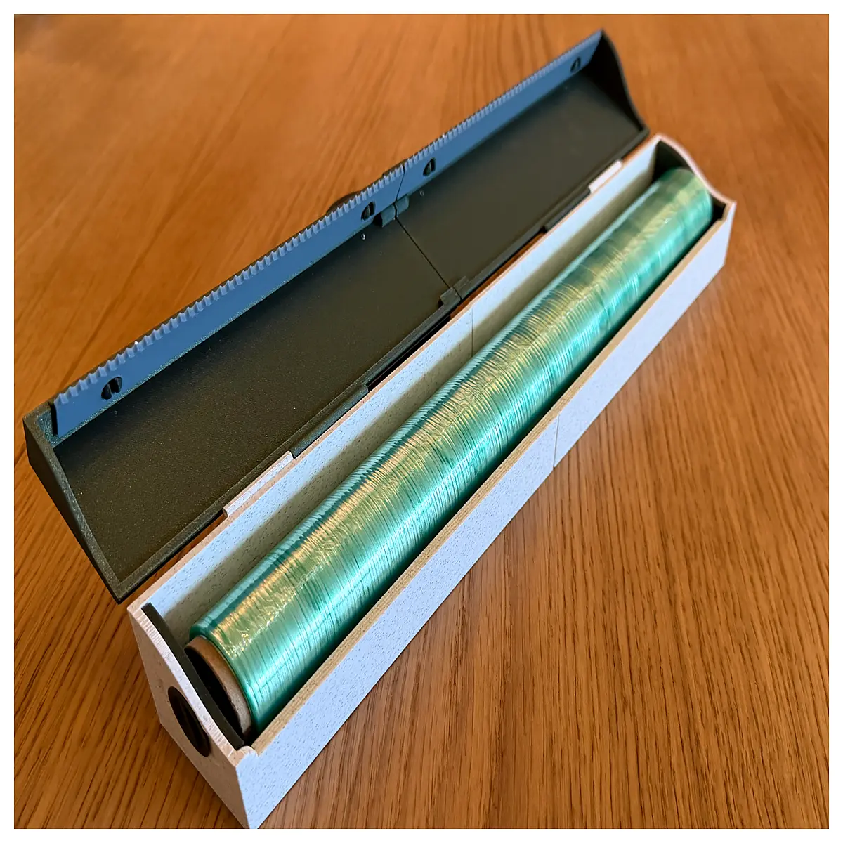 slim roll holder for plastic wrap cling film dispenser kitchen counter storage organizer