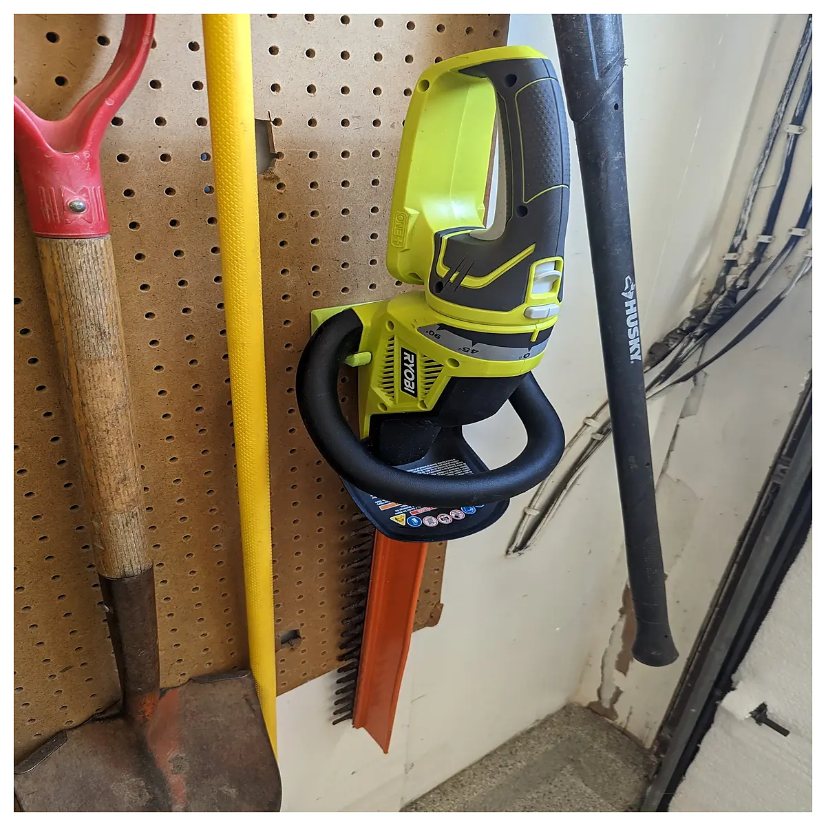ryobi string trimmer wall mount bracket storage organizer garage shed utility tool hanger duty