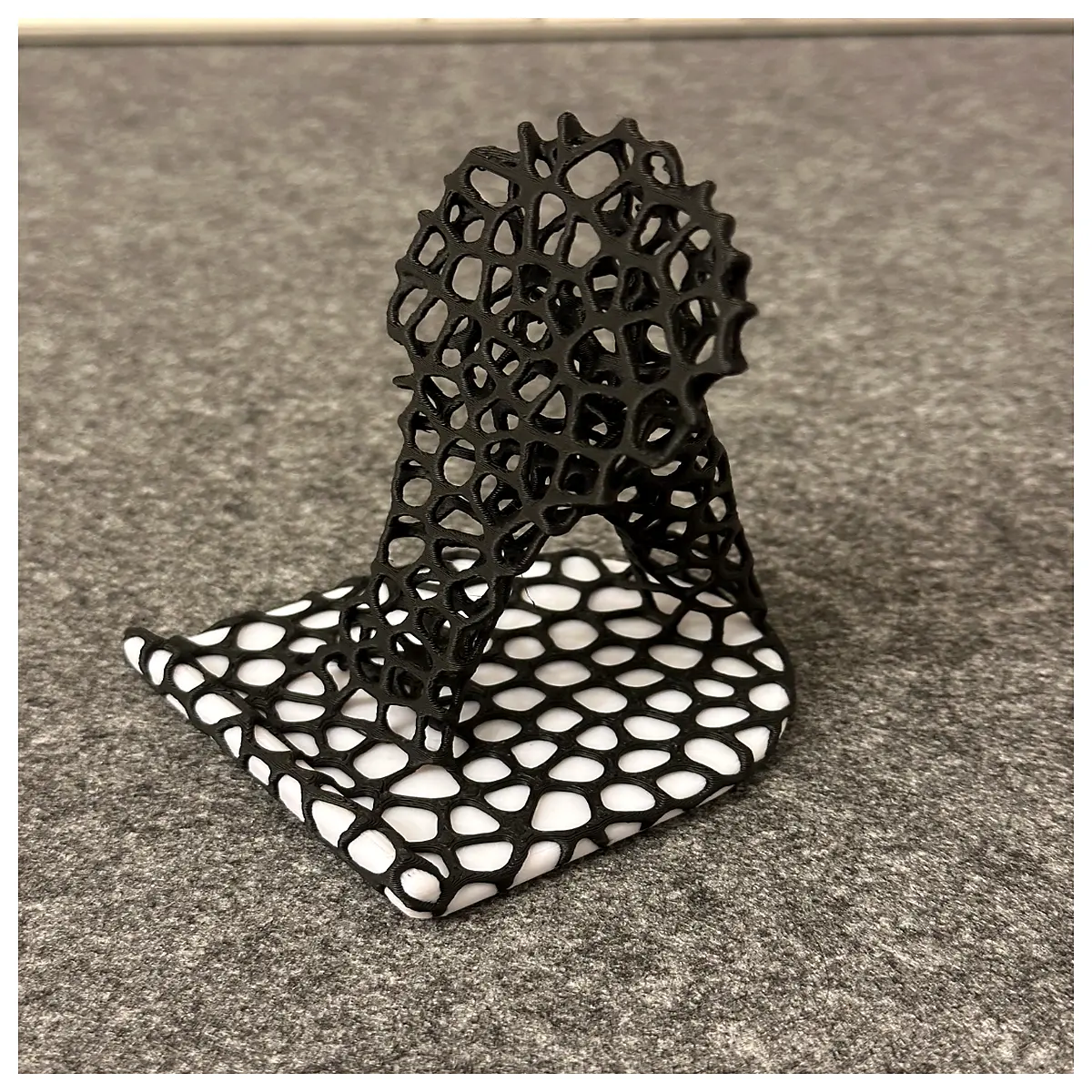 printed voronoi lattice phone desktop organizer geometric alloy grip non slip tech accessory