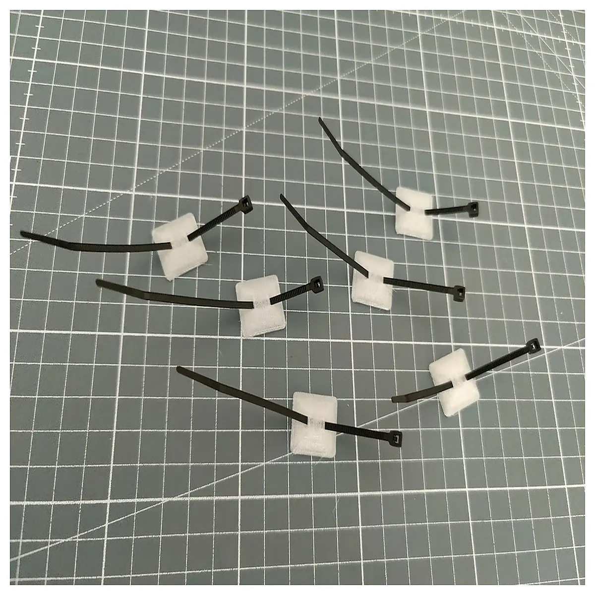 minimalist cable tie mount adhesive self sticking wire holder organizer for home office