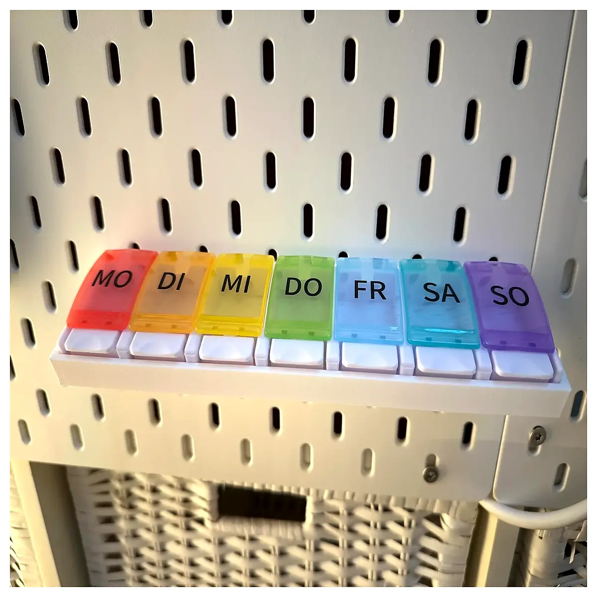 wall mounted pill organizer box with compartments for daily medication storage and sorting