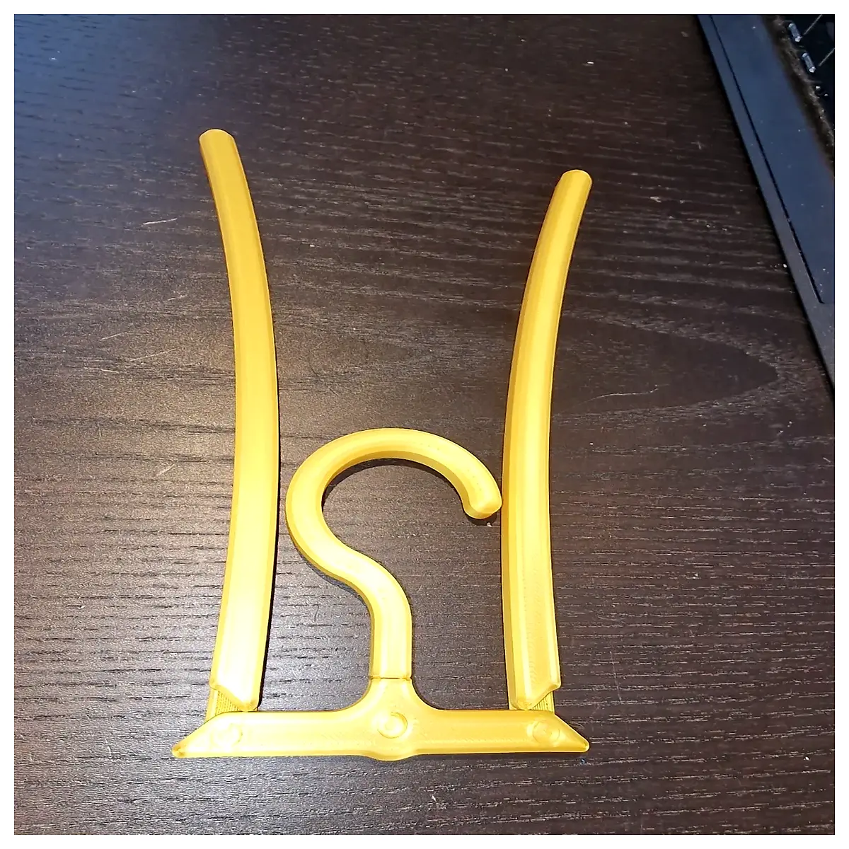 molded hanger with swivel hook and foldable legs for space saving closet organization