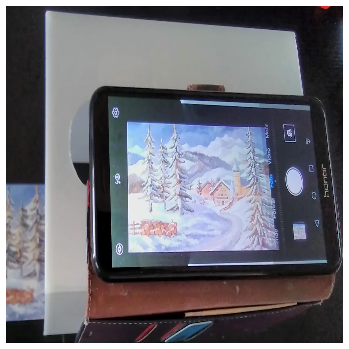 phone for scanning postcards notes documents hands mobile camera holder