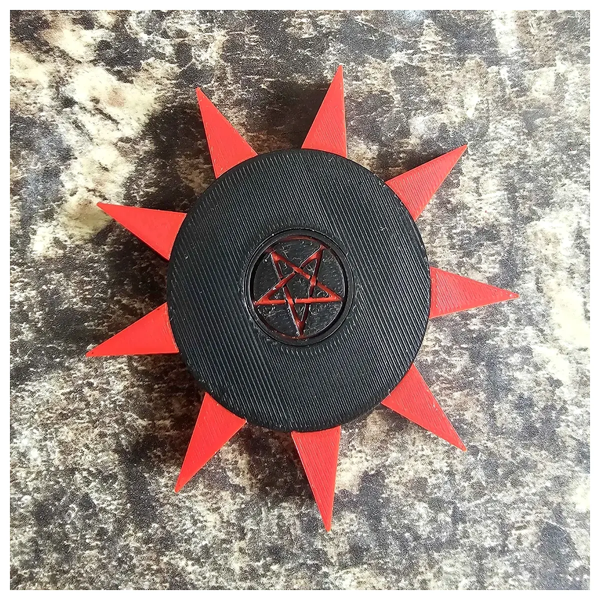 metal spinning top star shape with sharp spikes for desk stress relief and training