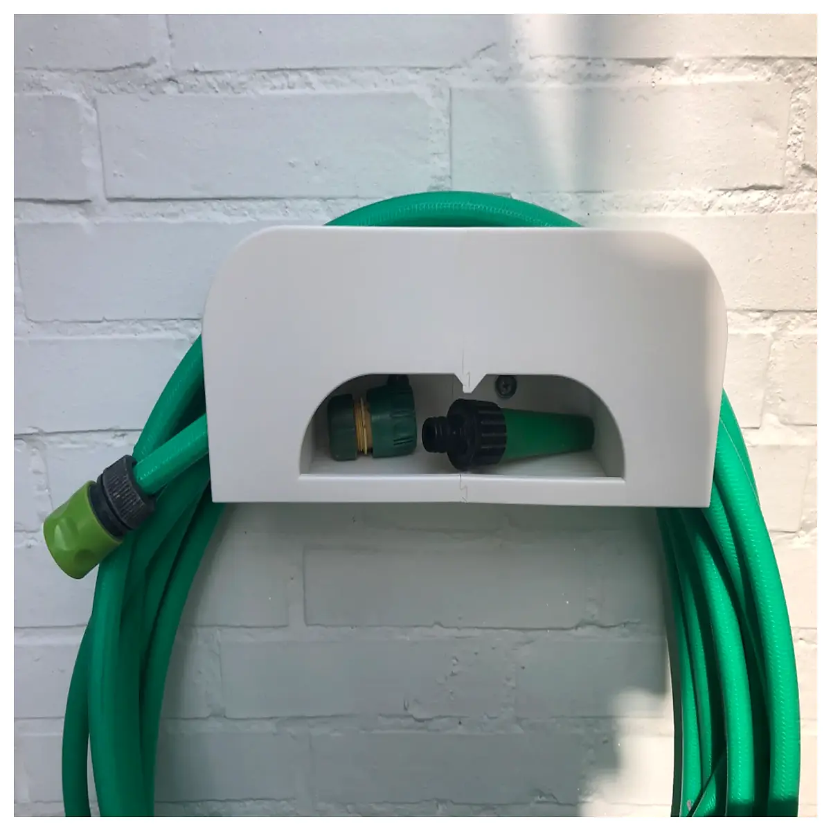 wall mounted garden hose reel holder rack storage organizer for outdoor patio no drip