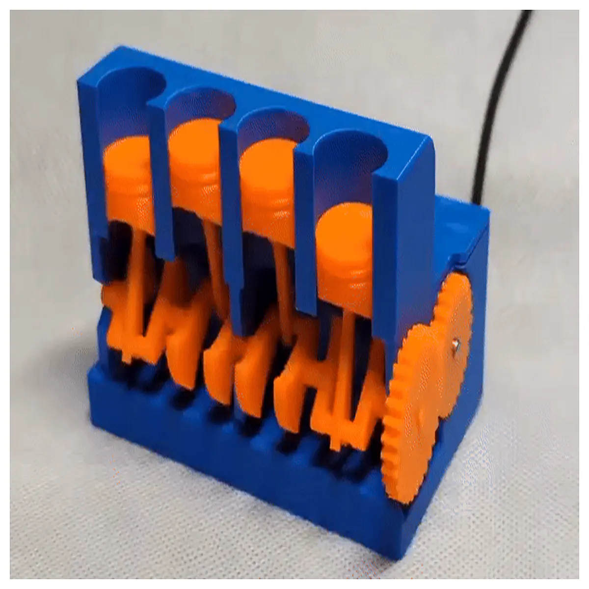 4 cylinder engine fidget toy kinetic stress relief desk gadget