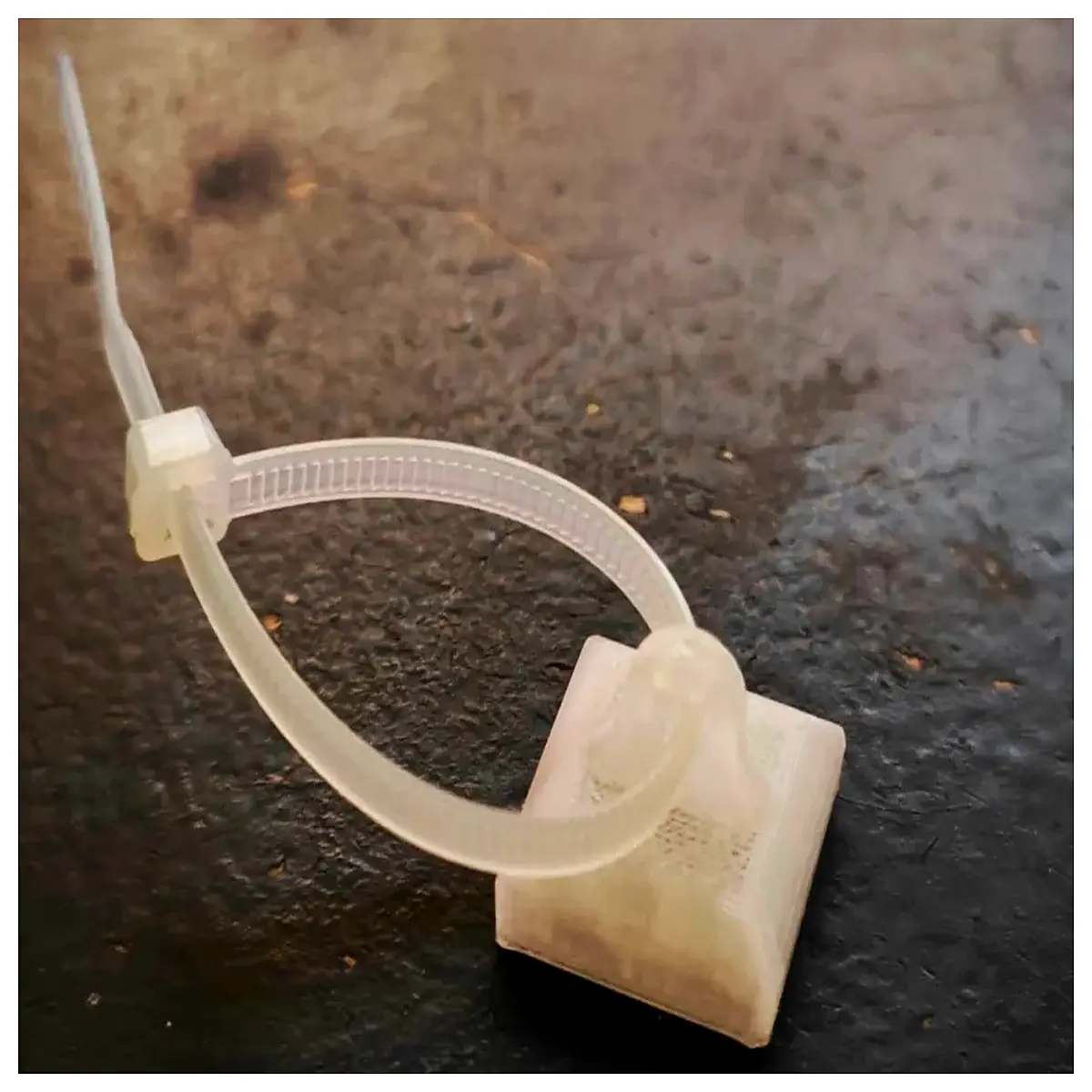 duty strap mount bracket for securing small equipment to walls or poles