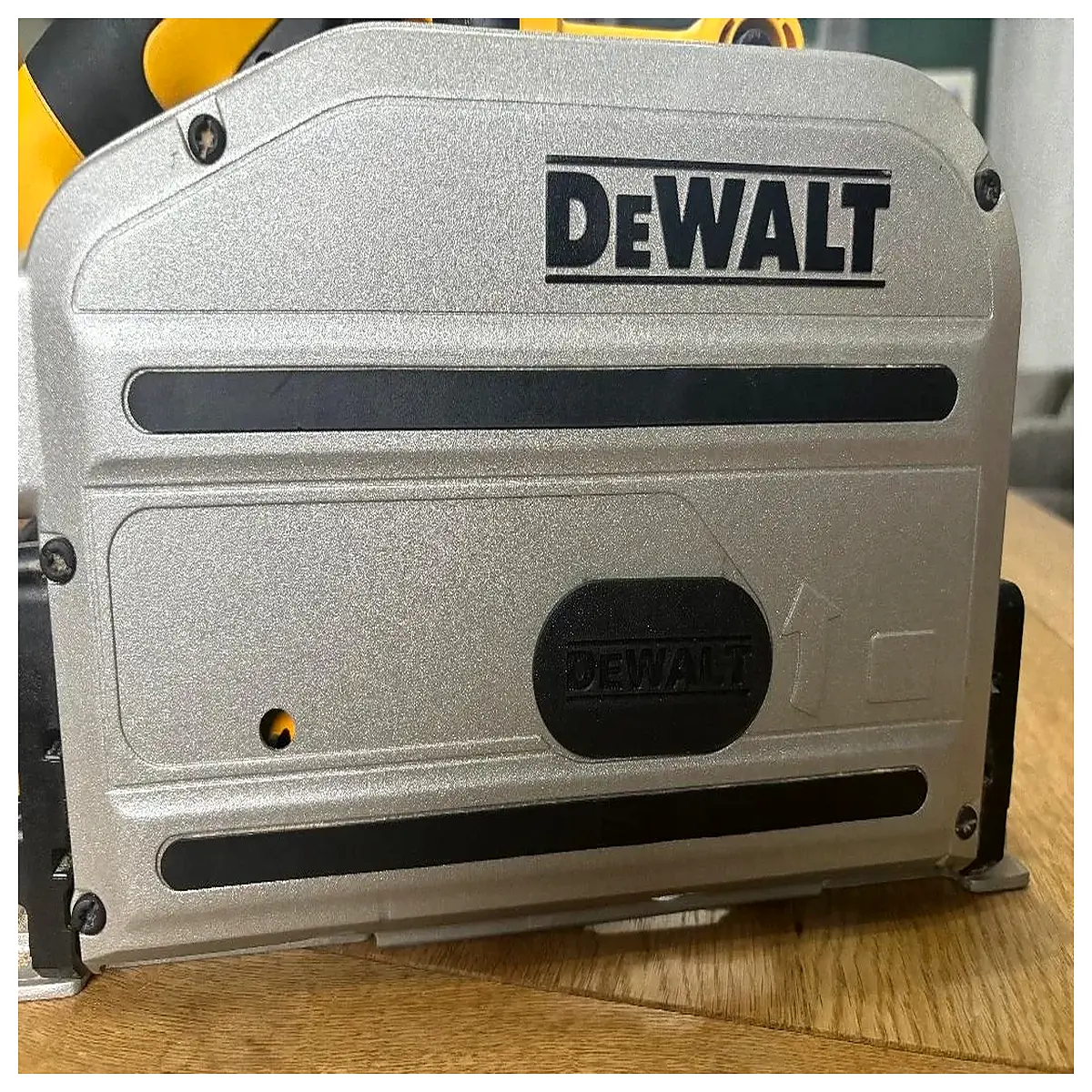 track saw collection hood adapter for efficient debris management and clean cutting workspace