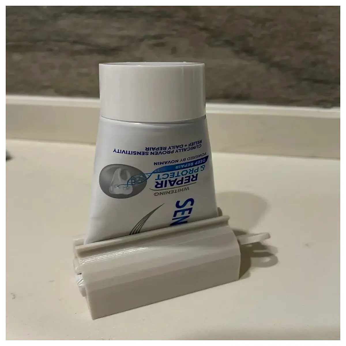 automatic toothpaste squeezer tube presser holder dispenser for bathroom sink organizer