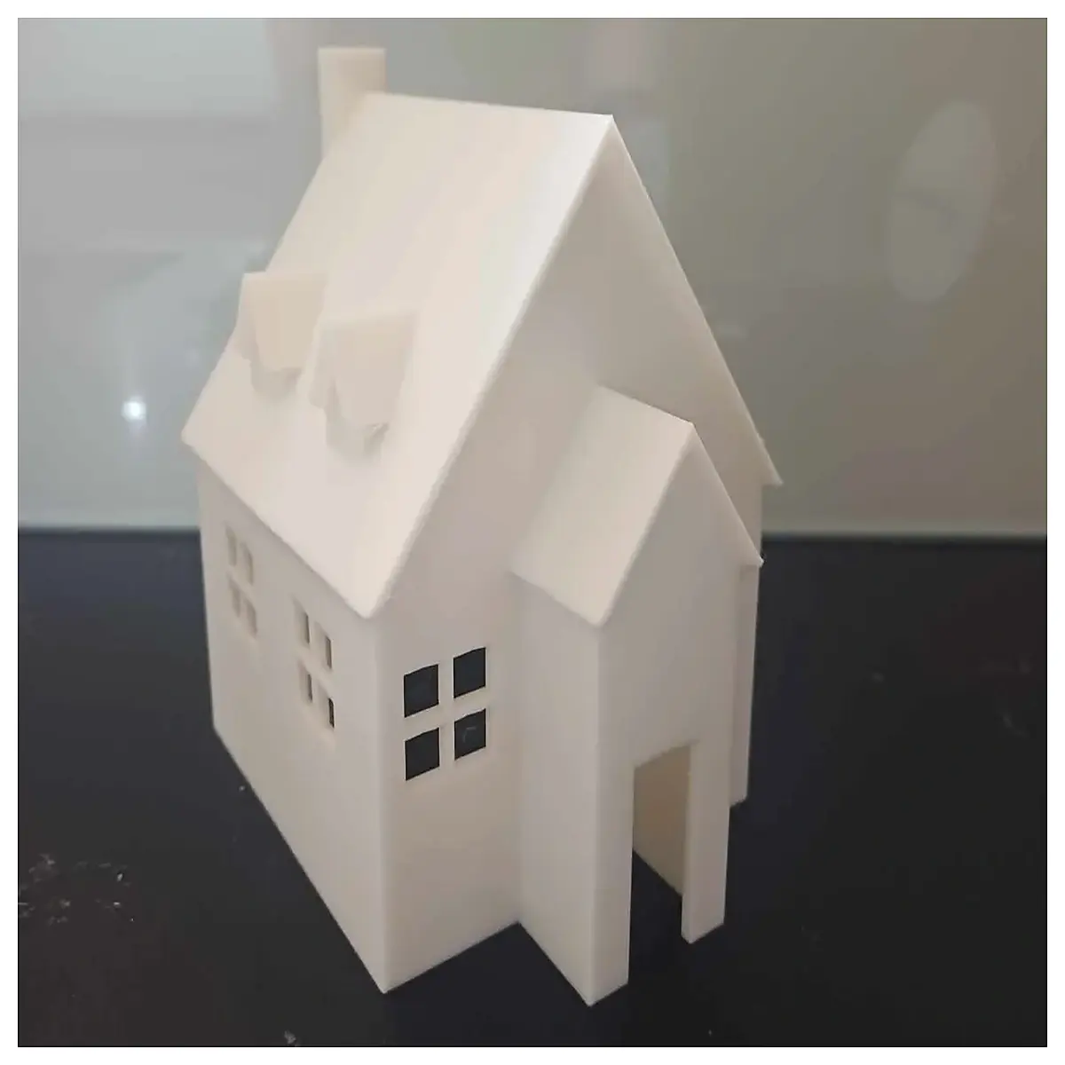 miniature wooden christmas cabin with snow roof for holiday table centerpiece decoration and winter village