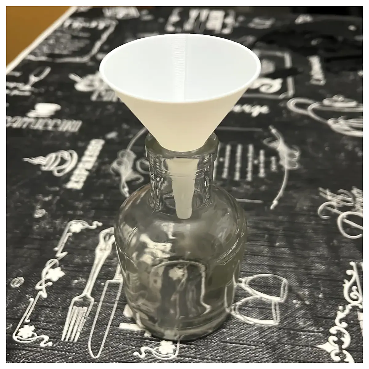 small funnel for precise pouring kitchen baking coffee oil transfer no spill plastic glass lab science