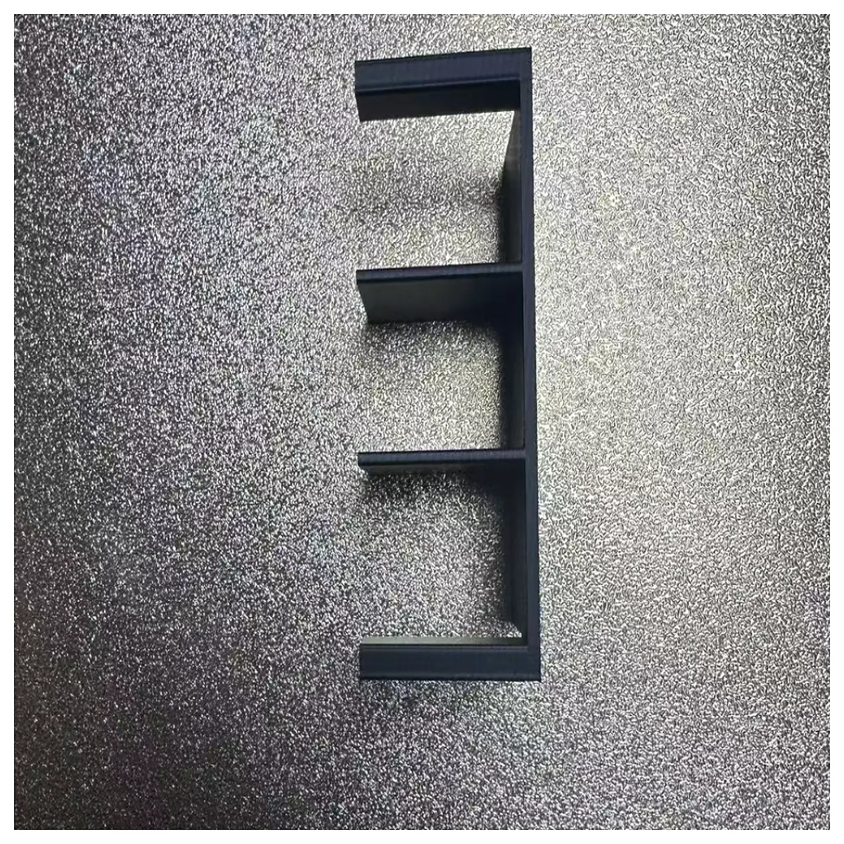 adjustable bookends with divider shelf for organizing books and binders on desk