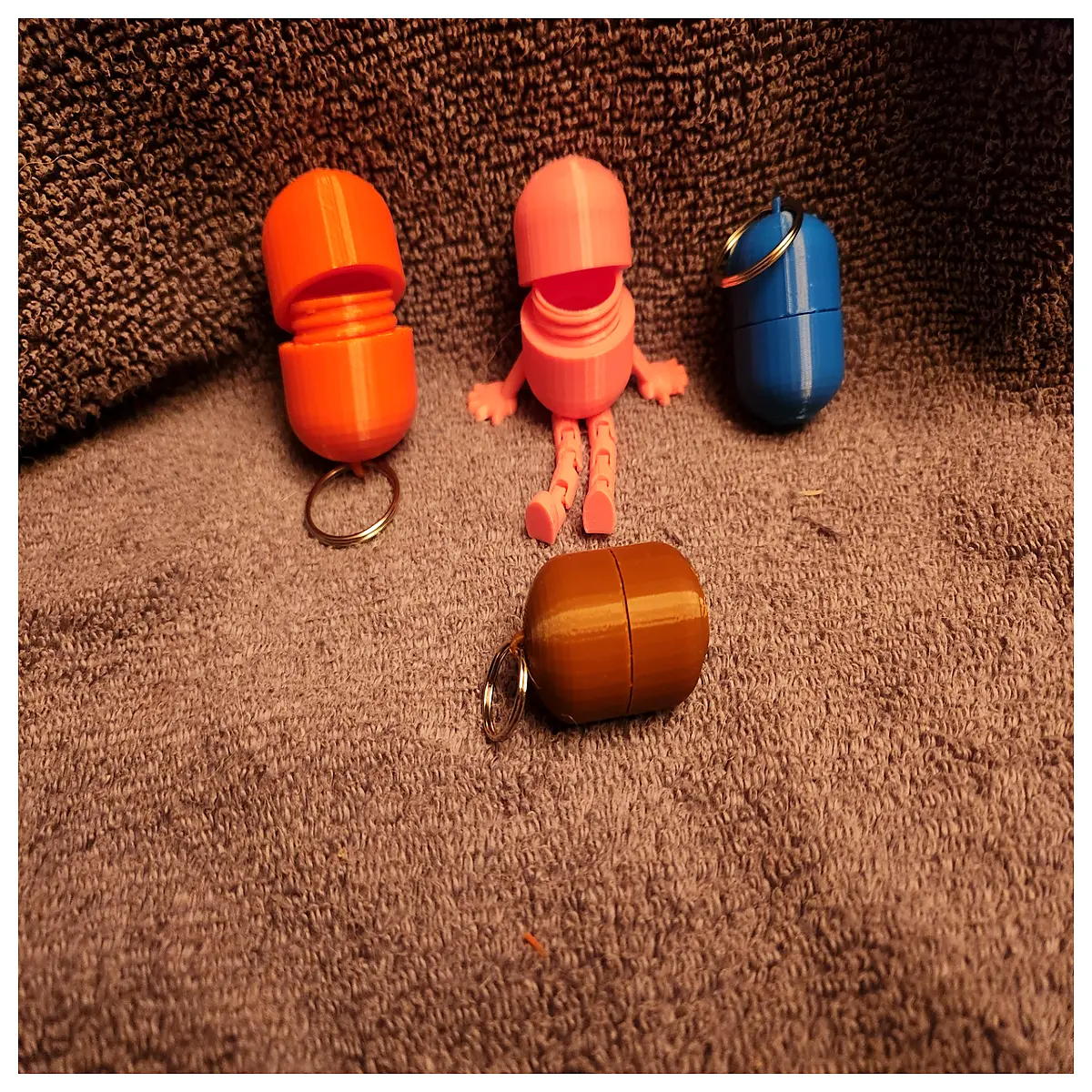 portable pill organizer keychain with daily compartments for travel medication reminder fob
