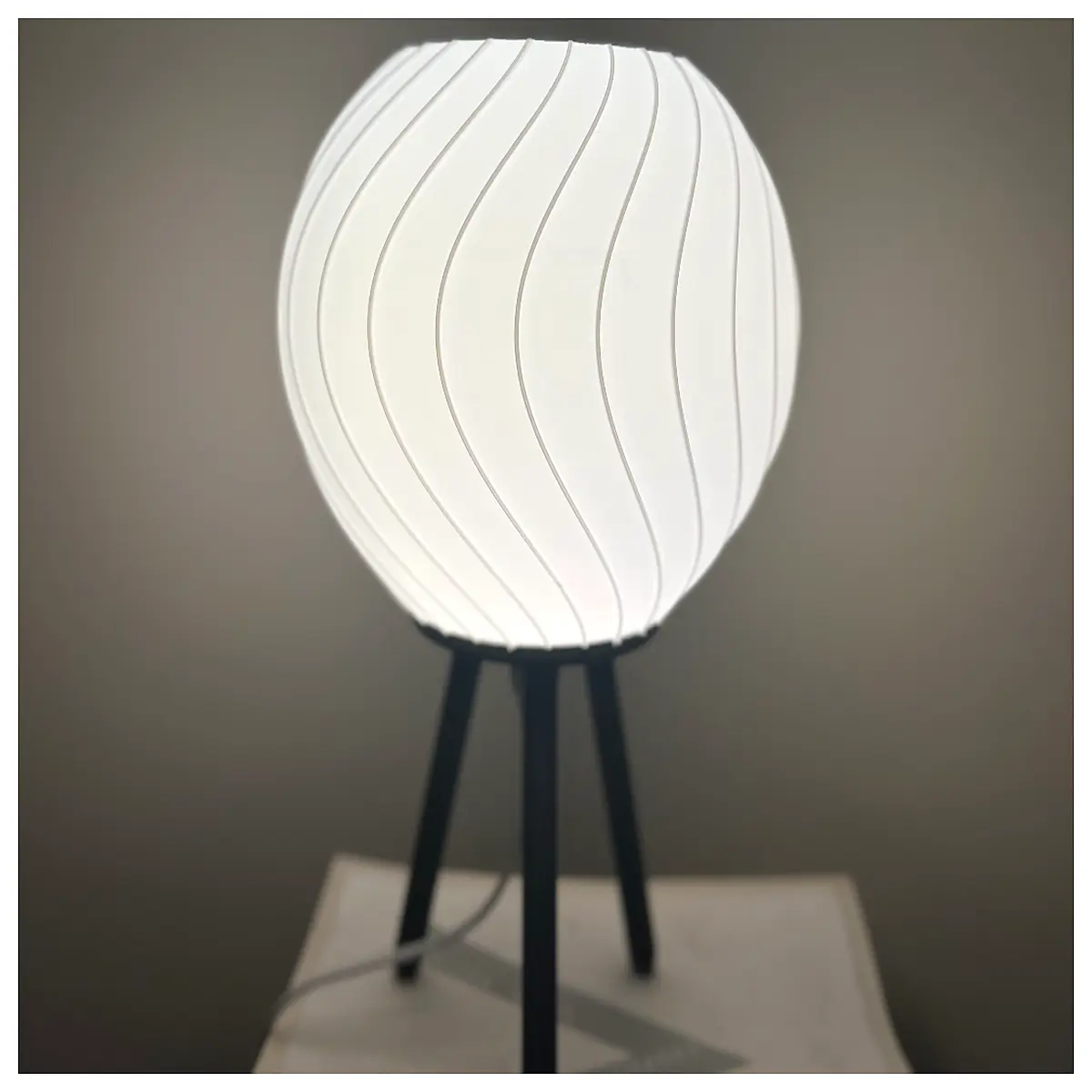 modern round pendant with linear design accents for dining room ceiling