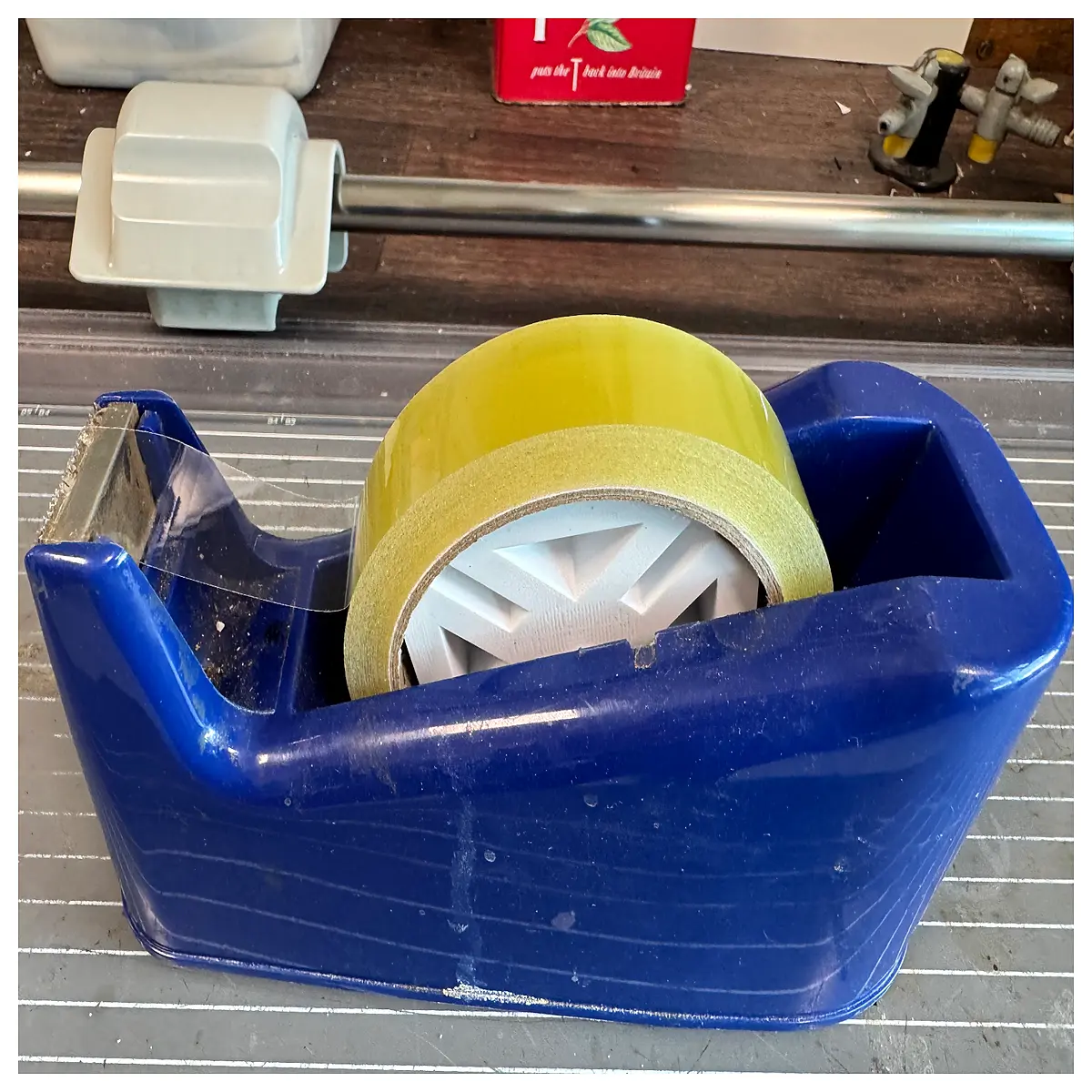 duty tape dispenser holder wall mount for packing boxes shipping supplies adhesive roll organizer