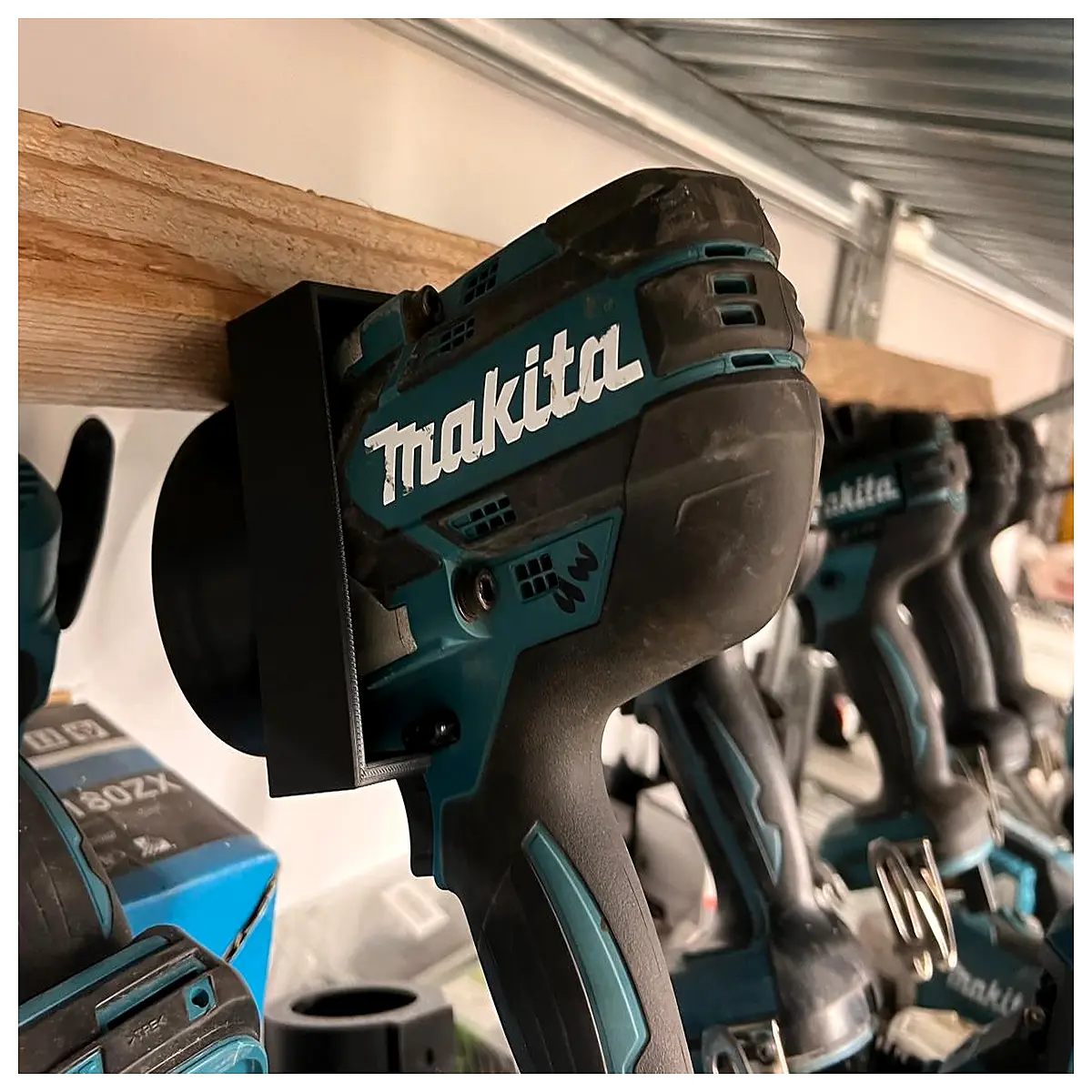 makita impact wrench bracket mount holder for garage workshop storage organization tool rack