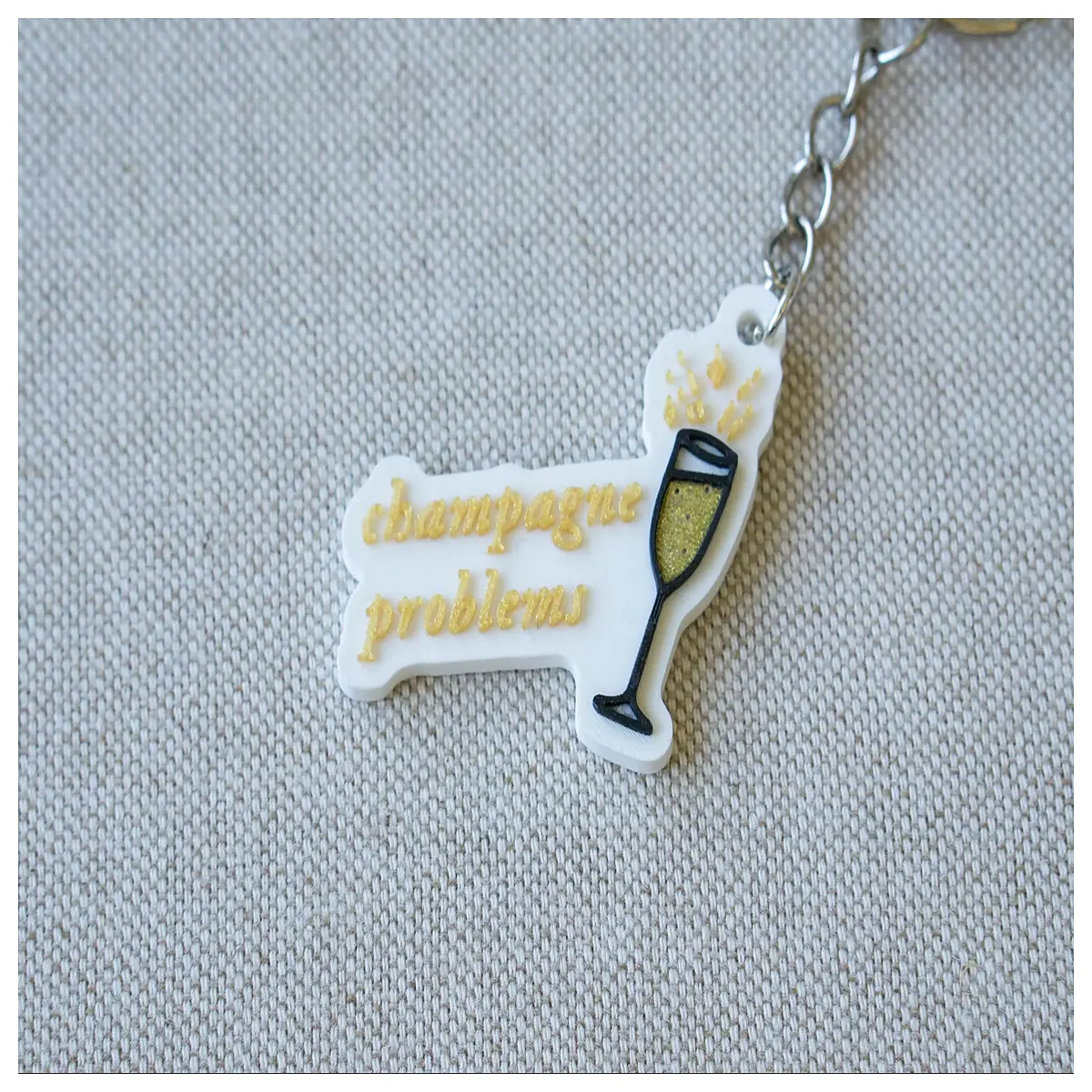 keychain the tortured poets department champagne aesthetic fans