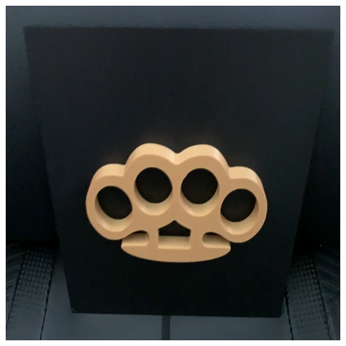 brass knuckle sculpture metal finger guard art piece industrial brass hand decor abstract fist statue for home