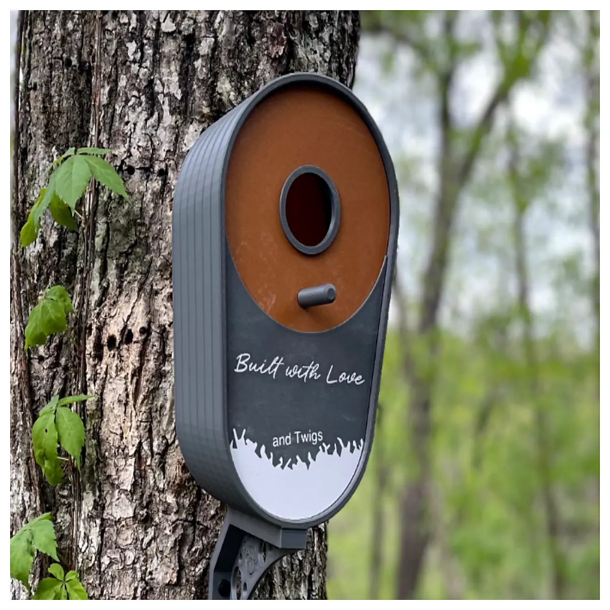 modern vertical oval birdhouse for small birds contemporary hanging nesting box with wide entrance hole sleek metal or wood design for backyard garden