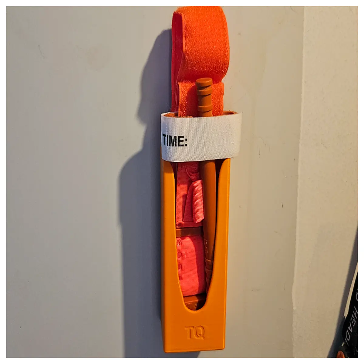 wall mounted tourniquet holder quick access emergency trauma storage mount for ambulance