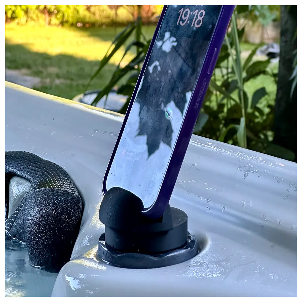 bathtub caddy tray with phone holder for waterproof storage of shampoo soap and books while relaxing in spa tub