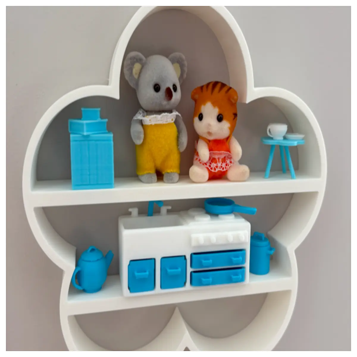 openwork floral pattern shelf with two internal dividers for organized storage and decorative