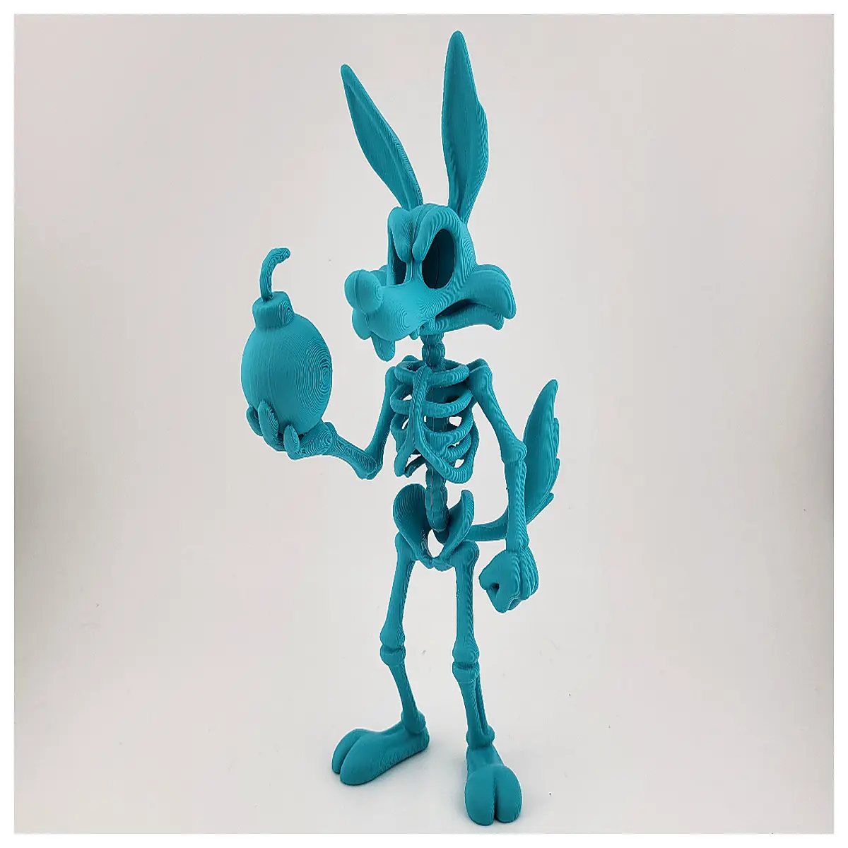 wile e coyote skeleton figure with bomb prop collectible toy