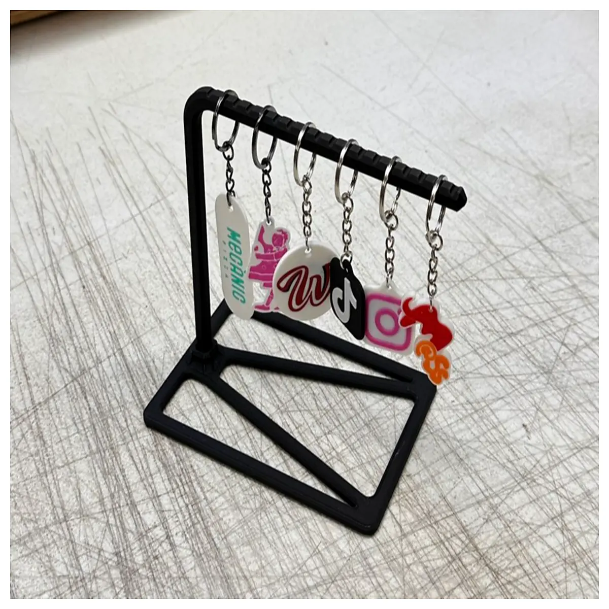 keychain organizer bulk distribution dispenser for retail shop marketing promo items